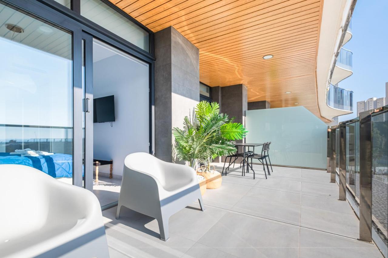 בנידורם Sunset Waves Deluxe Apartments Poniente Beach Resort מראה חיצוני תמונה